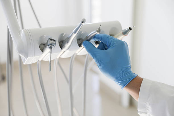 Professional Tooth Extraction technician working in Jeffersonville, IN